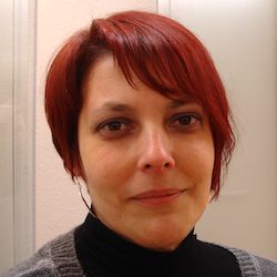 a woman with red hair looking into the camera, hair coloring, Layered hair