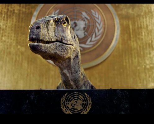 a Dinosaur in front of United Nation logl