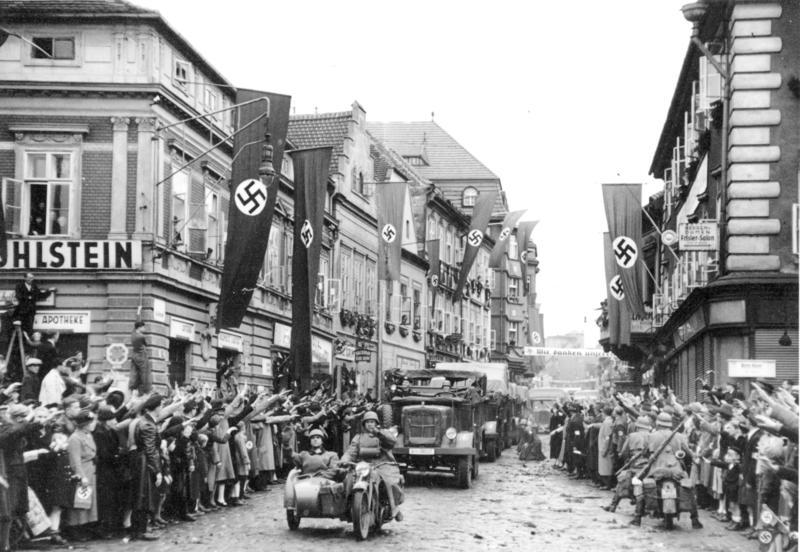 Ethnic Germans greeting German soldiers, 1938